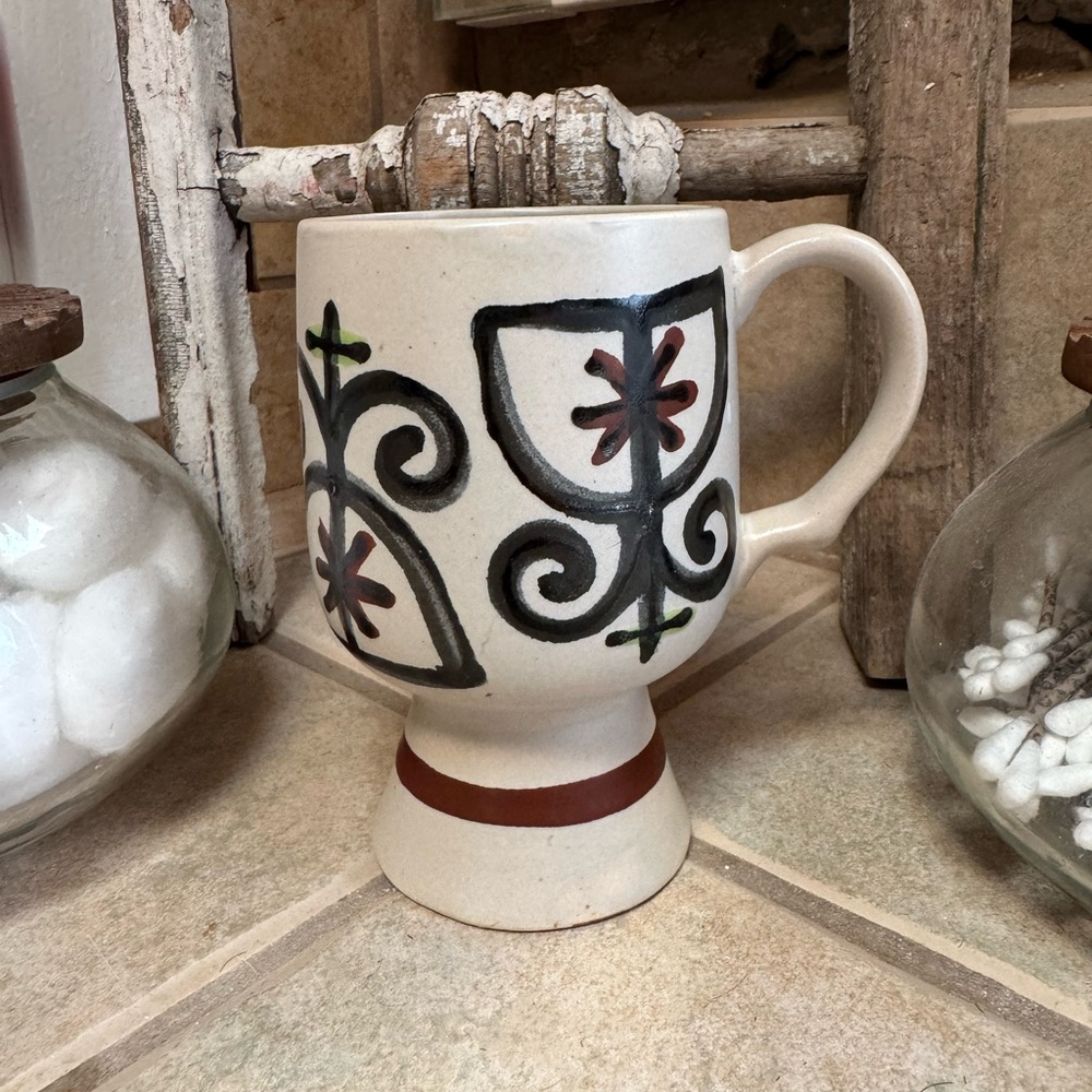 Artistic Ceramic Mug with Black and Red Design